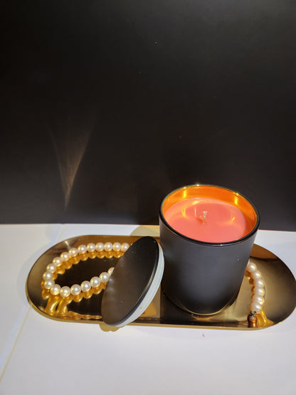 10oz Cashmere Musk soy candle, in an elegant matted black container with gold interior. Fill your space with this masculine beautiful scent. 